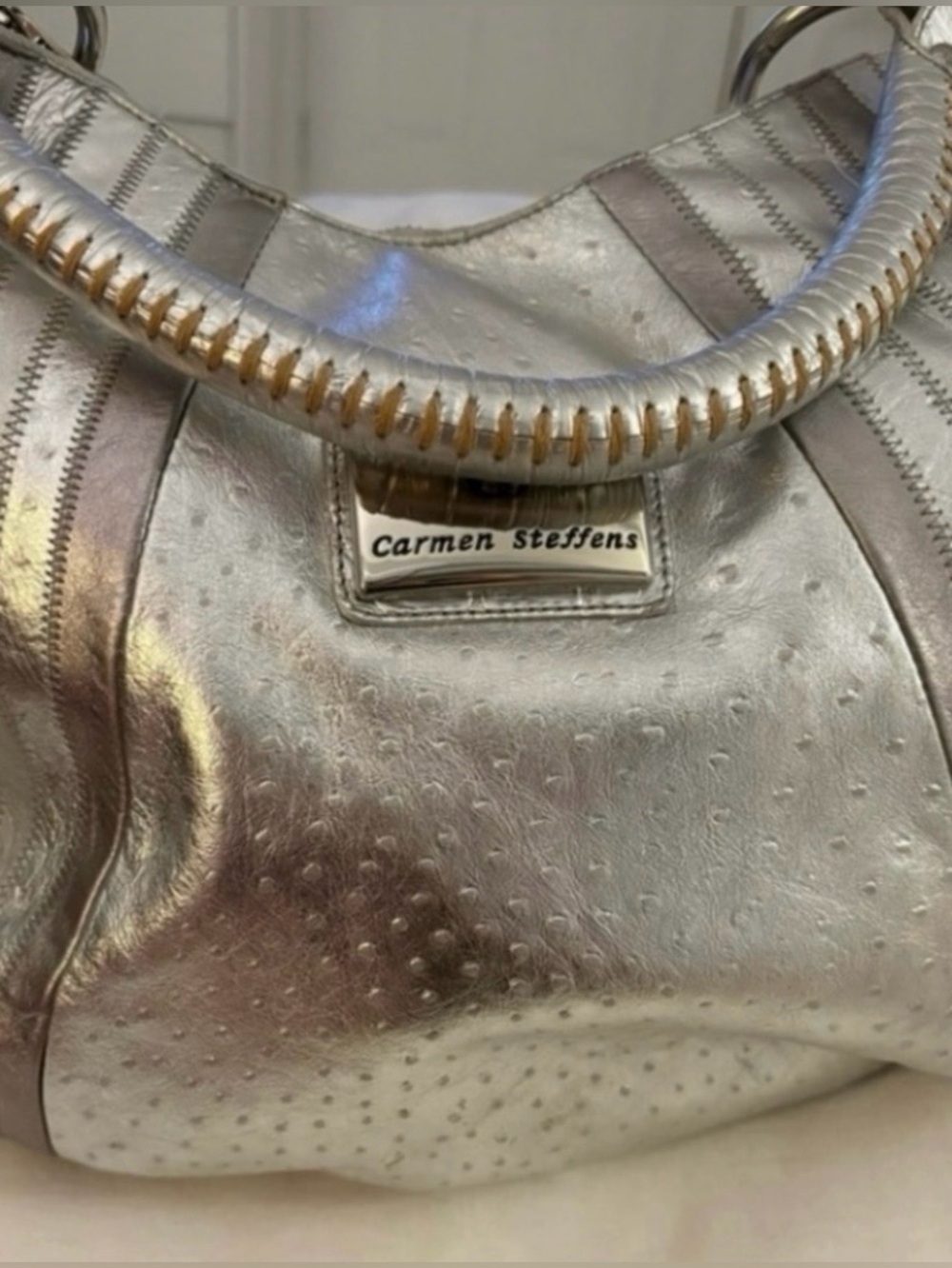 Vintage Carmen Steffens
Silver embossed hobo bag/purse